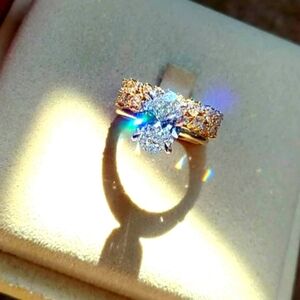 Platinum and 14k yellow gold 3ct e vvs2 lab oval diamond ring and  matching band